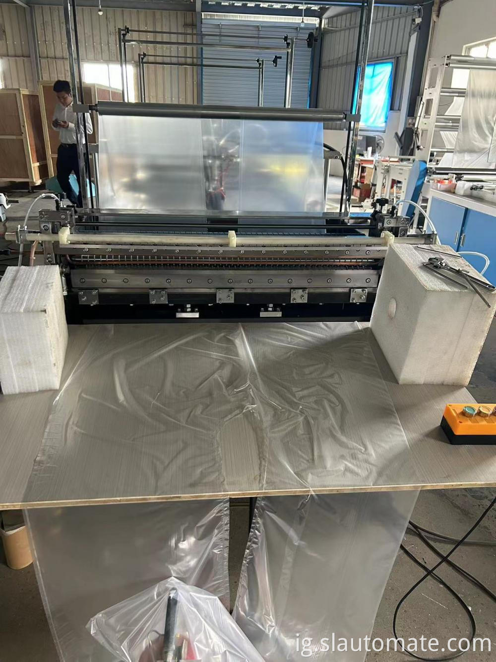 Disposable raincoat making machine